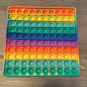 Giant rainbow pop it